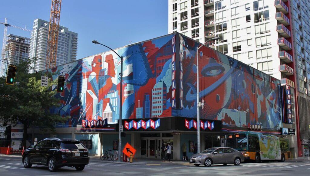 Seattle Cinerama pictured after its 2014 renovation / Wikipedia / SounderBruce 
Link: https://en.wikipedia.org/wiki/Seattle_Cinerama#/media/File:Cinerama_Seattle_exterior,_2015.jpg