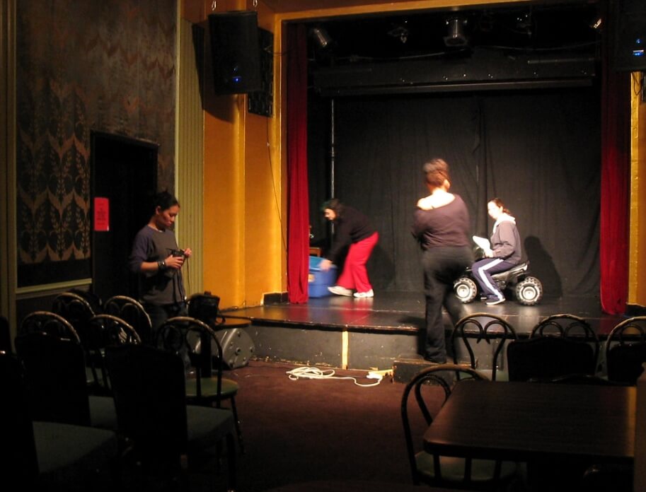 The crew sets up the stage for the show / Flickr / Chris Blakeley
Link: https://www.flickr.com/photos/csb13/56179686
